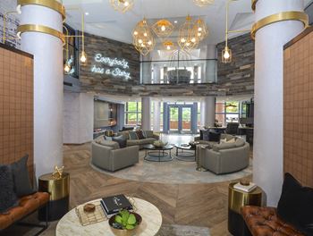 The resident lobby with cozy couches and tables